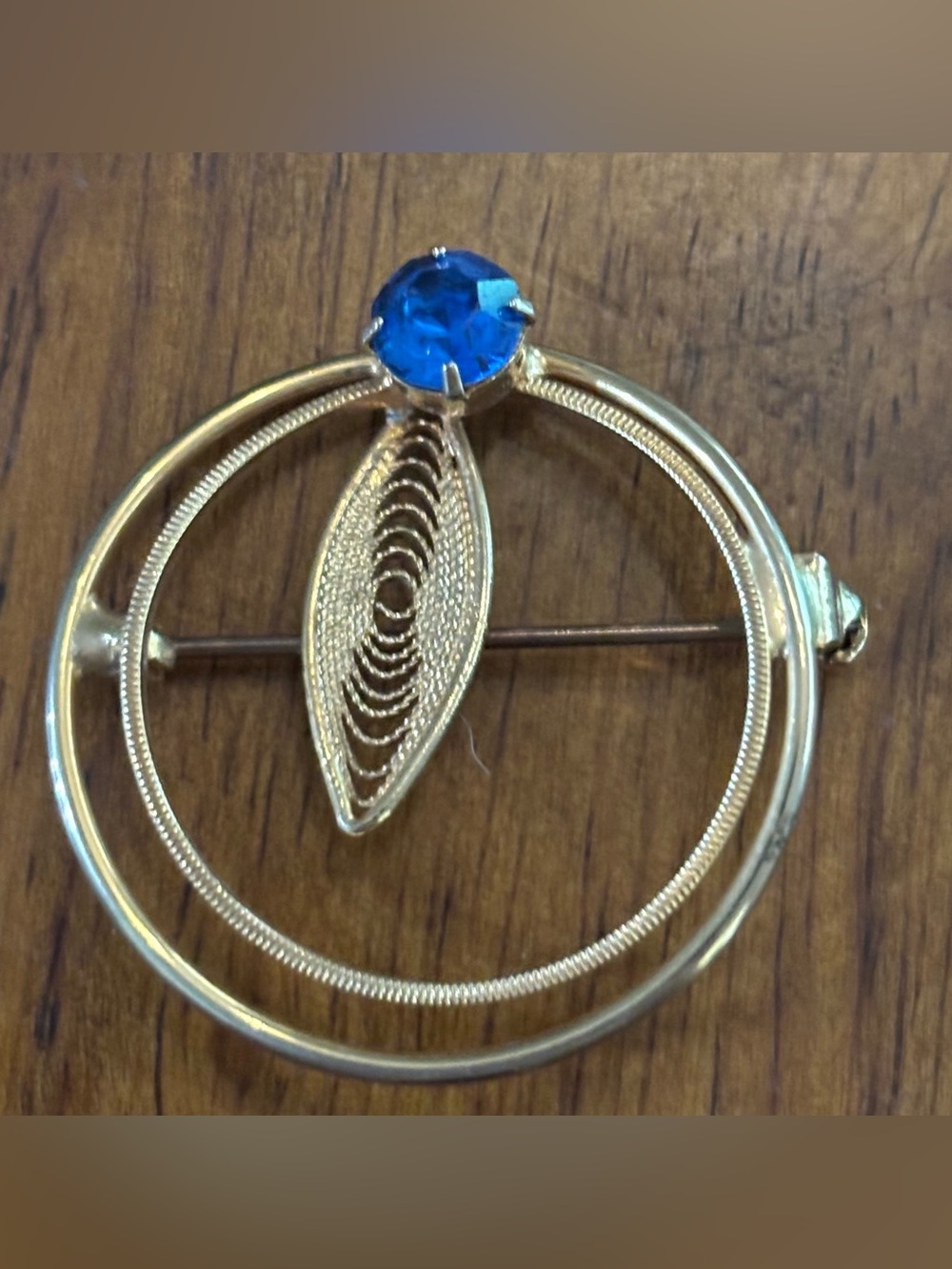 Vintage Ice Blue Rhinestone & Gold Tone Filigree Circular Brooch Pin